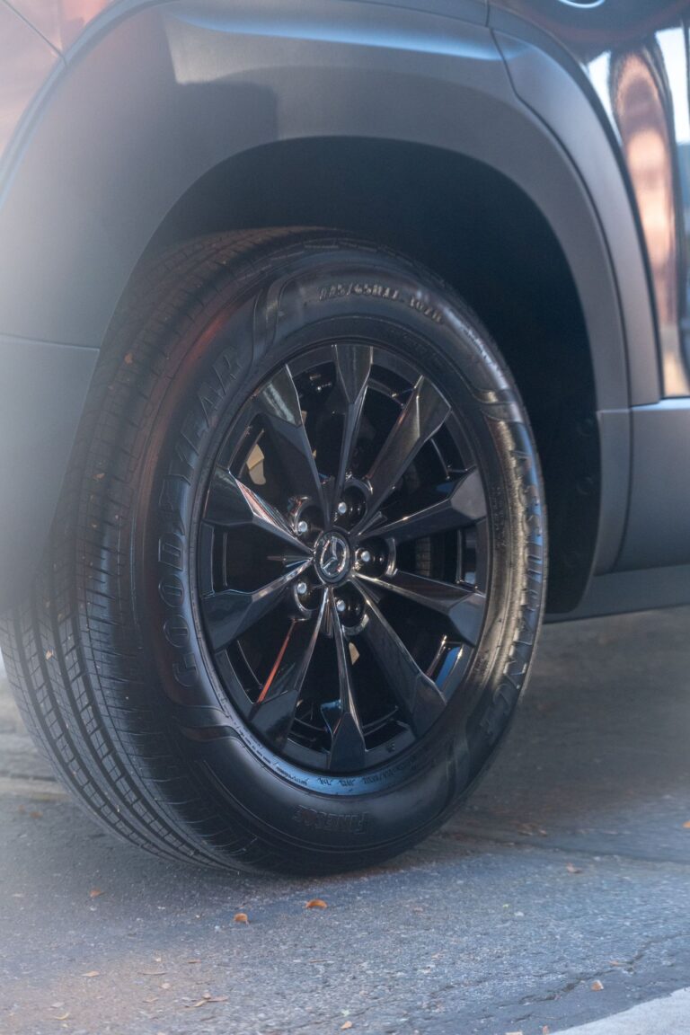 Gloss black wheel on a detailed 2026 Mazda CX-50